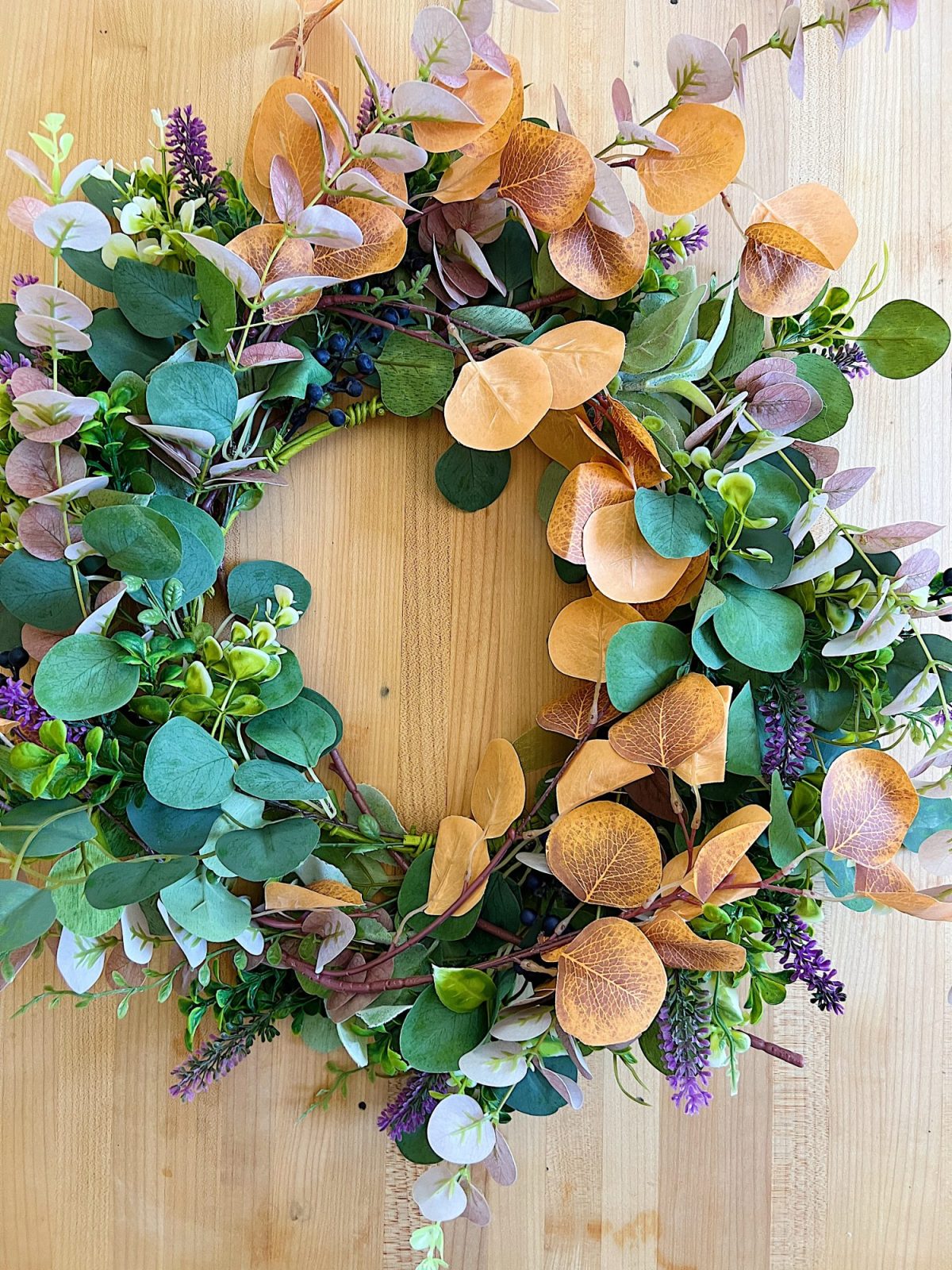 Decorating our family room with peach, pink, and copper repurposed and recycled fall decor.