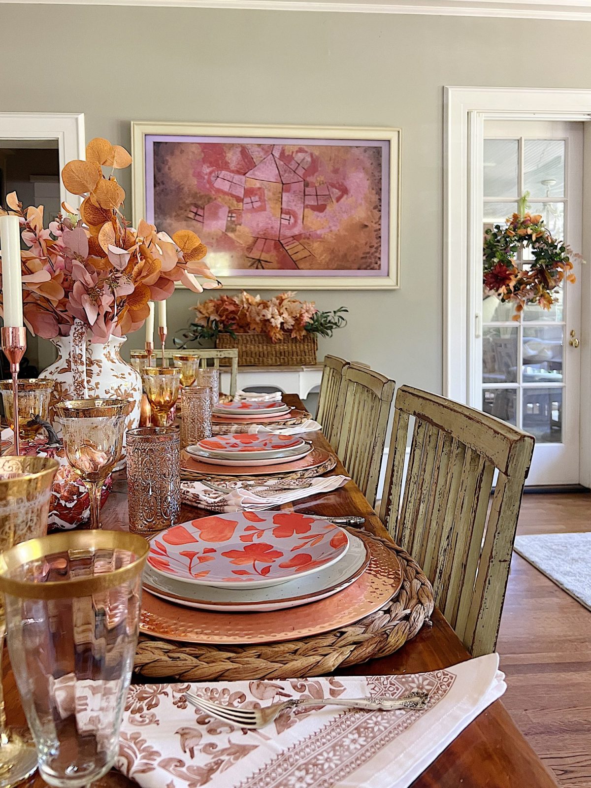 Decorating our family room with peach, pink, and copper repurposed and recycled fall decor.