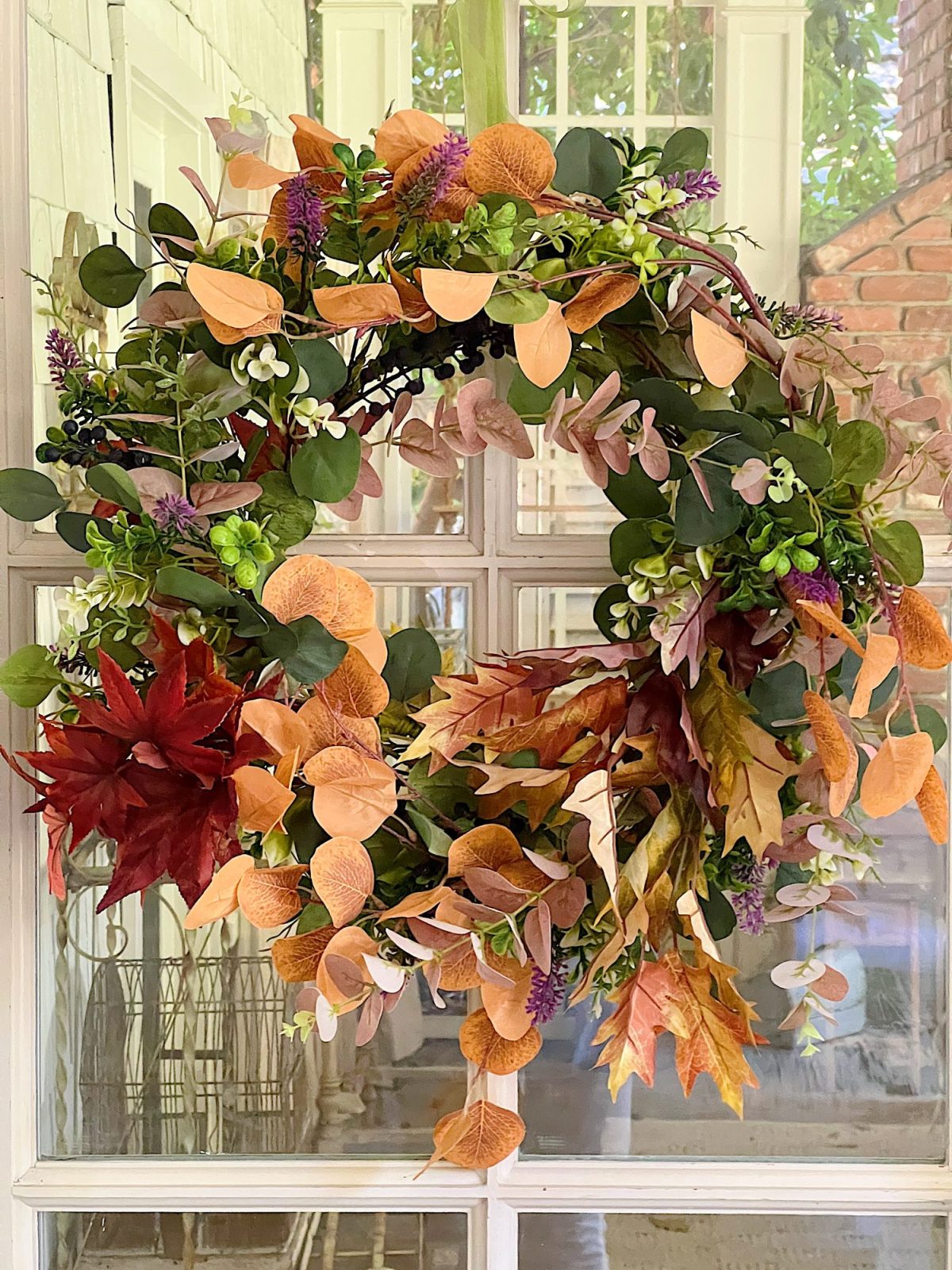 Decorating our family room with peach, pink, and copper repurposed and recycled fall decor.
