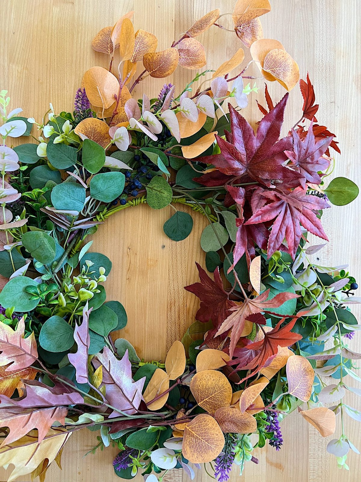 Decorating our family room with peach, pink, and copper repurposed and recycled fall decor.
