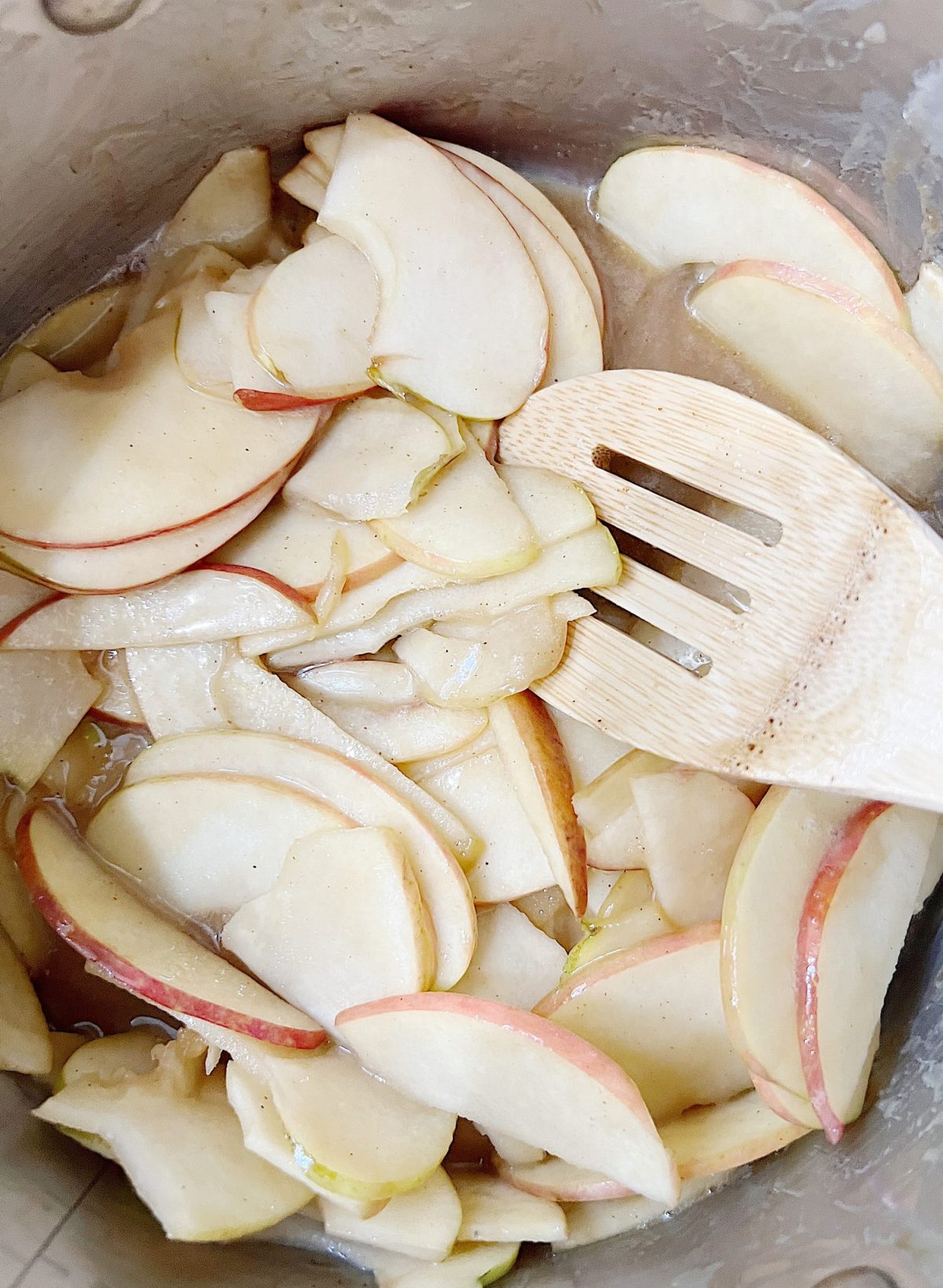 Homemade apple rose tartlets with caramel.