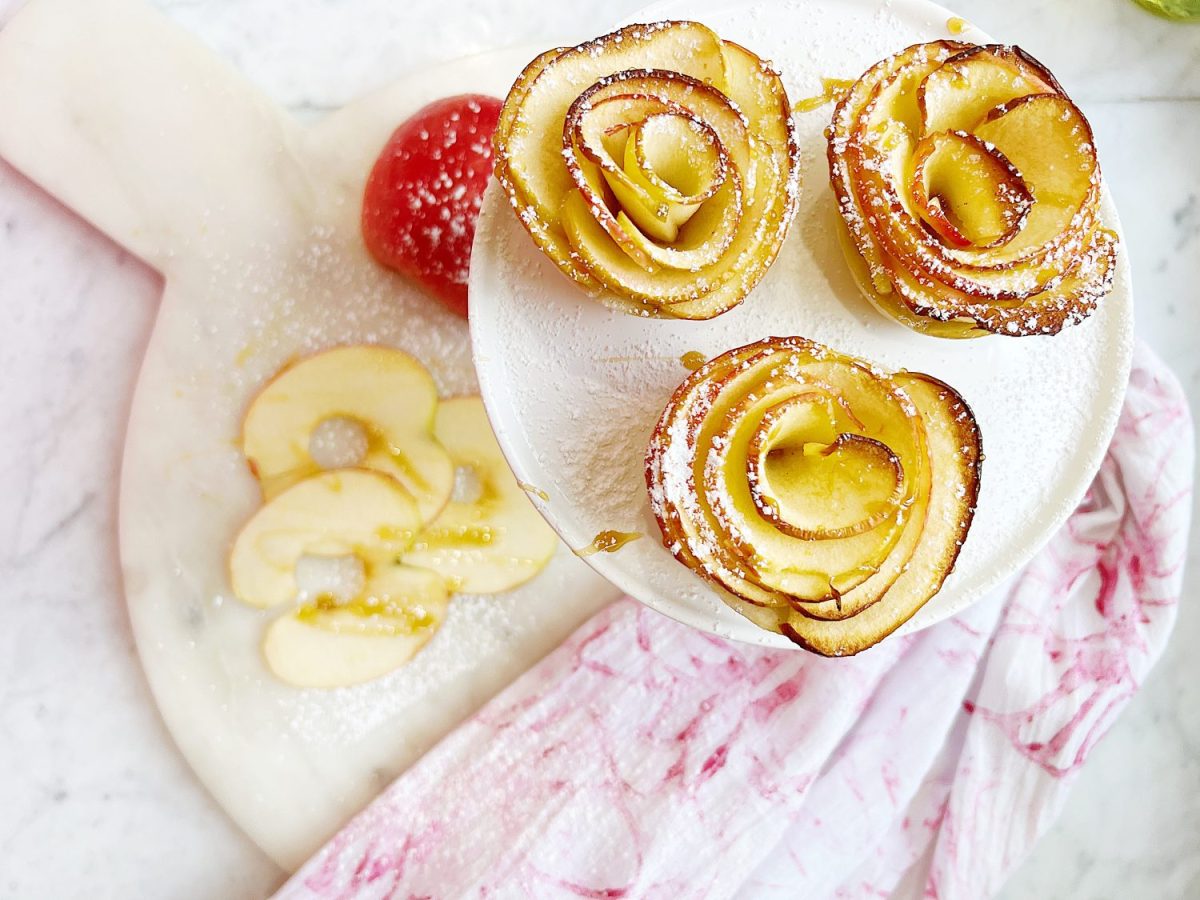 Homemade apple rose tartlets with caramel.