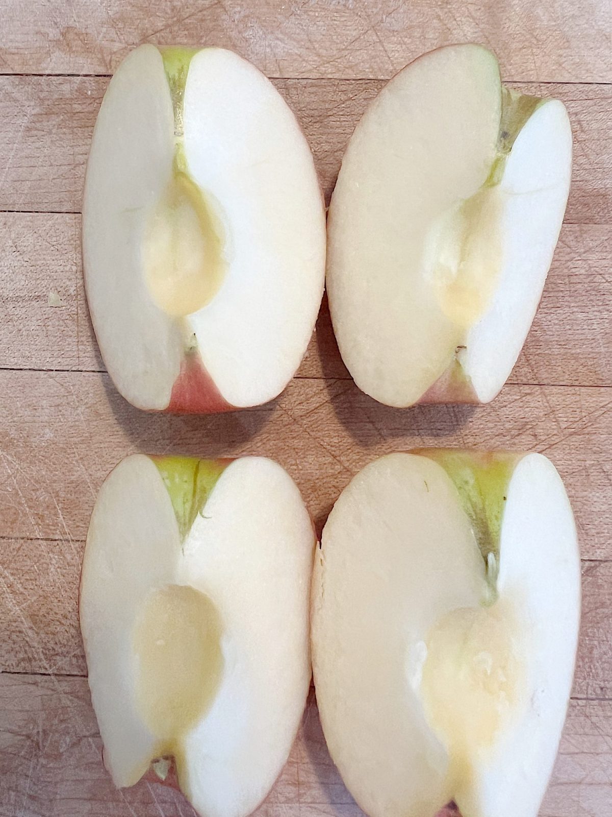 Homemade apple rose tartlets with caramel.