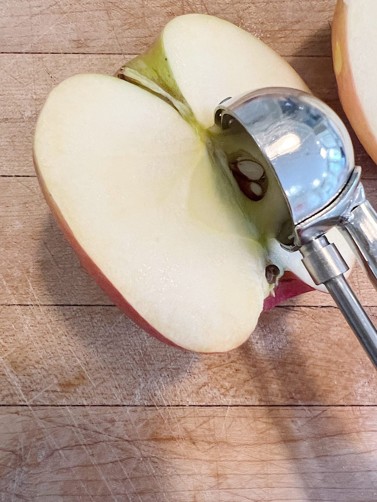 Homemade apple rose tartlets with caramel.
