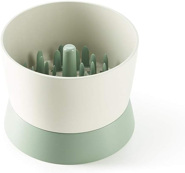 A round, two-tone protein bowl for pets, featuring raised vertical ridges inside to slow down eating and encourage healthy mealtime habits.