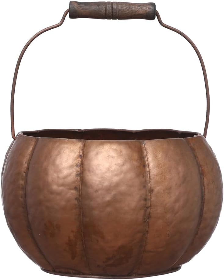 A copper cauldron with a round, ribbed design and a wooden handle, perfect for your fall pumpkin décor.