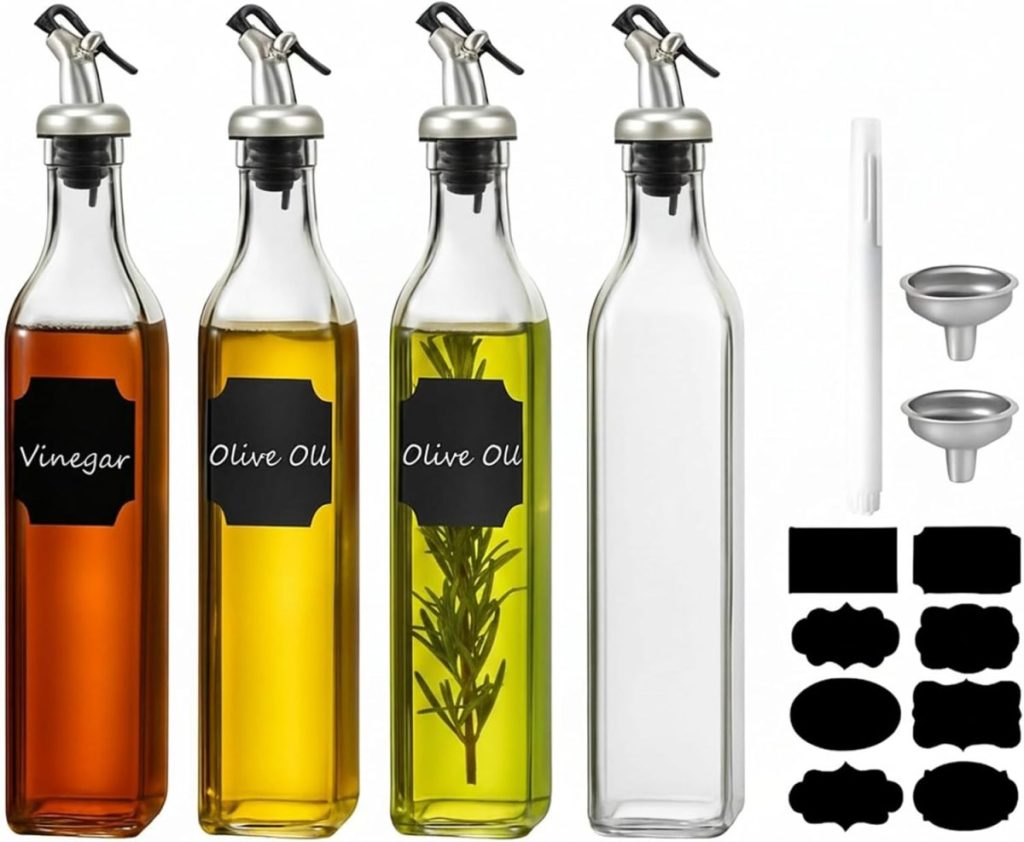 Four glass bottles with pour spouts, perfect for organizing vinegar and olive oil in your pantry cabinet. One bottle features herbs, another is empty. Includes extra labels, funnels, and a marker—smart addition to your pantry cabinet ideas.