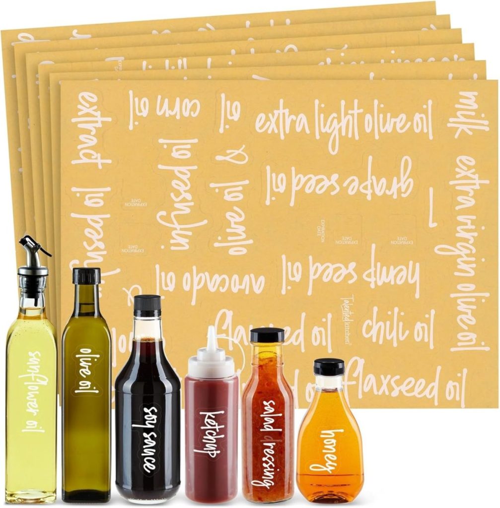 Four labeled sheets with various oil names in white text are shown behind six different labeled bottles of condiments and oils, including olive oil, soy sauce, ketchup, and honey—perfect inspiration for your pantry cabinet ideas.