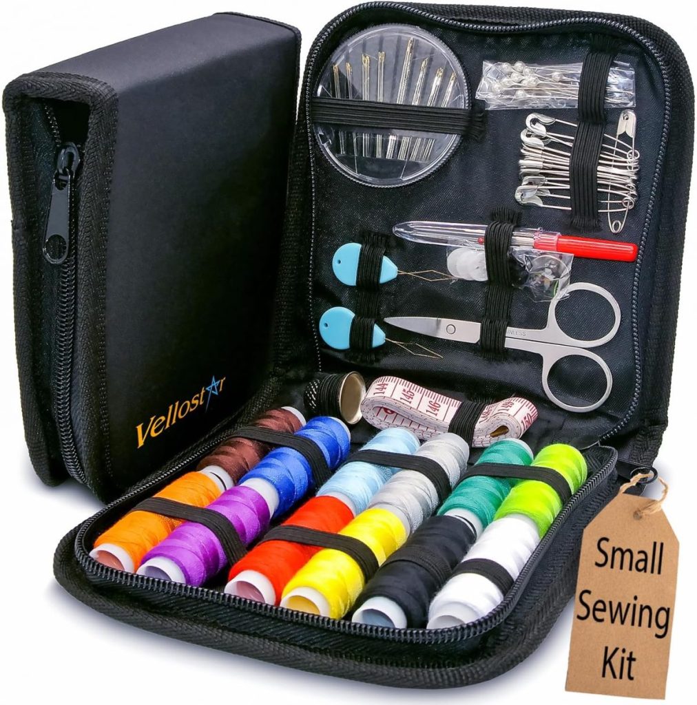 A compact sewing kit is open, displaying various colored threads, needles, a small pair of scissors, safety pins, a measuring tape, and a seam ripper—all perfect for quick fall pumpkin crafting projects—with a tag stating "Small Sewing Kit.