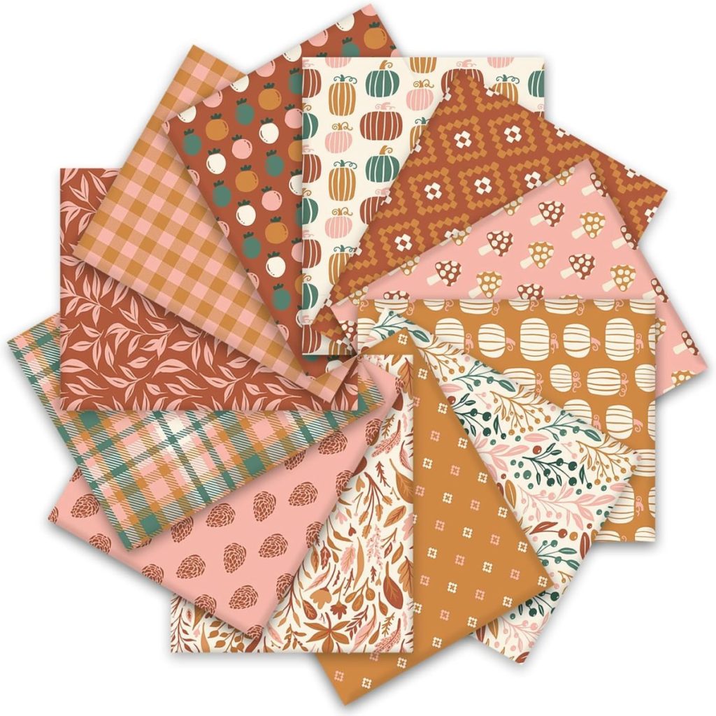 A collection of 16 rectangular pieces of patterned paper in various autumn-themed designs and colors, including fall pumpkins, arranged in a circular layout against a white background.