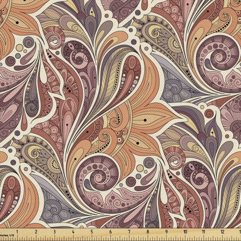 A colorful paisley pattern with intricate swirls and curves in shades of orange, purple, red, and beige evokes the warmth of fall pumpkins. A ruler at the bottom indicates scale.