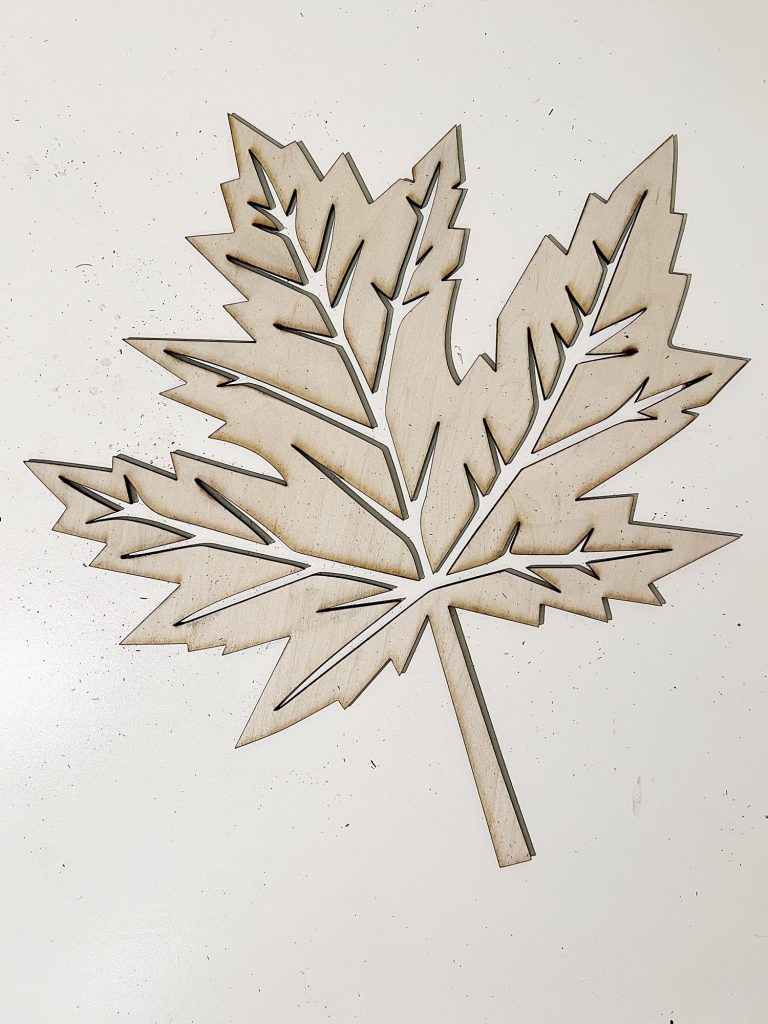 Designing and cutting a fall leaf wood charger with an xtool m1 laser cutting machine.