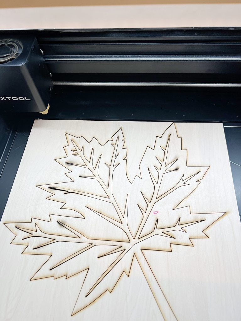 Designing and cutting a fall leaf wood charger with an xtool m1 laser cutting machine.