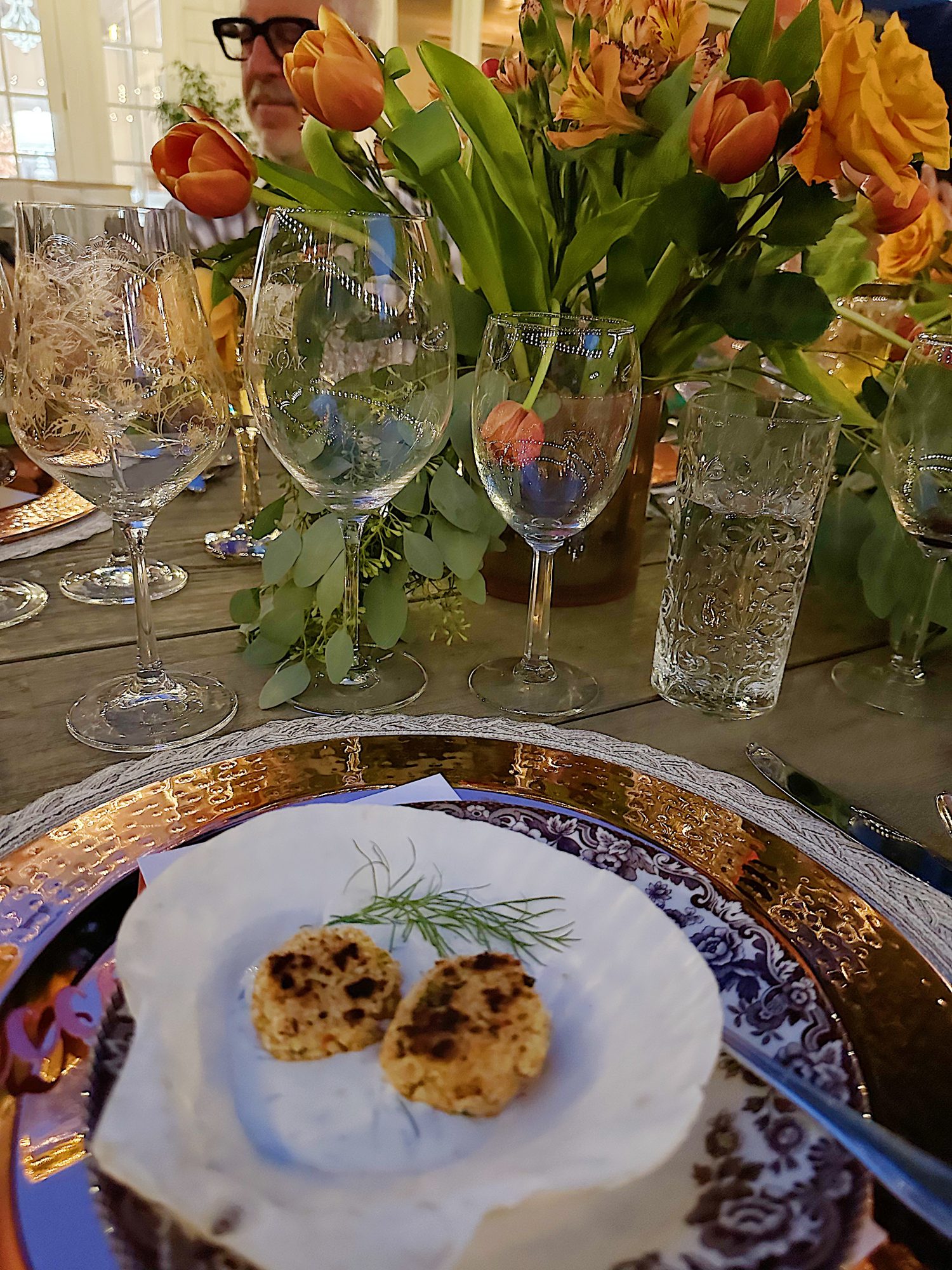 Cooking and plating the crab cakes for a dinner for eight which was planned and hosted by us to benefit charity.