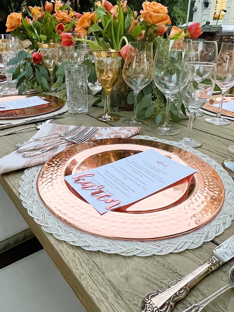 Setting the table for a dinner for eight which was planned and hosted by us to benefit charity.