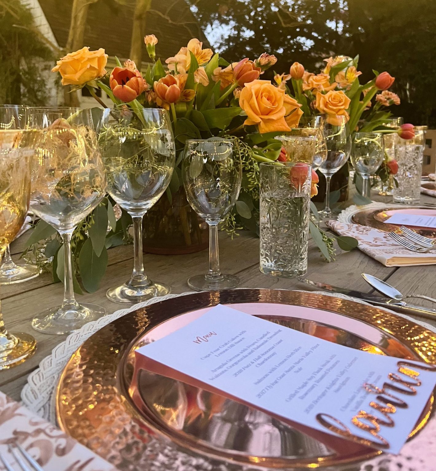 Setting the table for a dinner for eight which was planned and hosted by us to benefit charity.