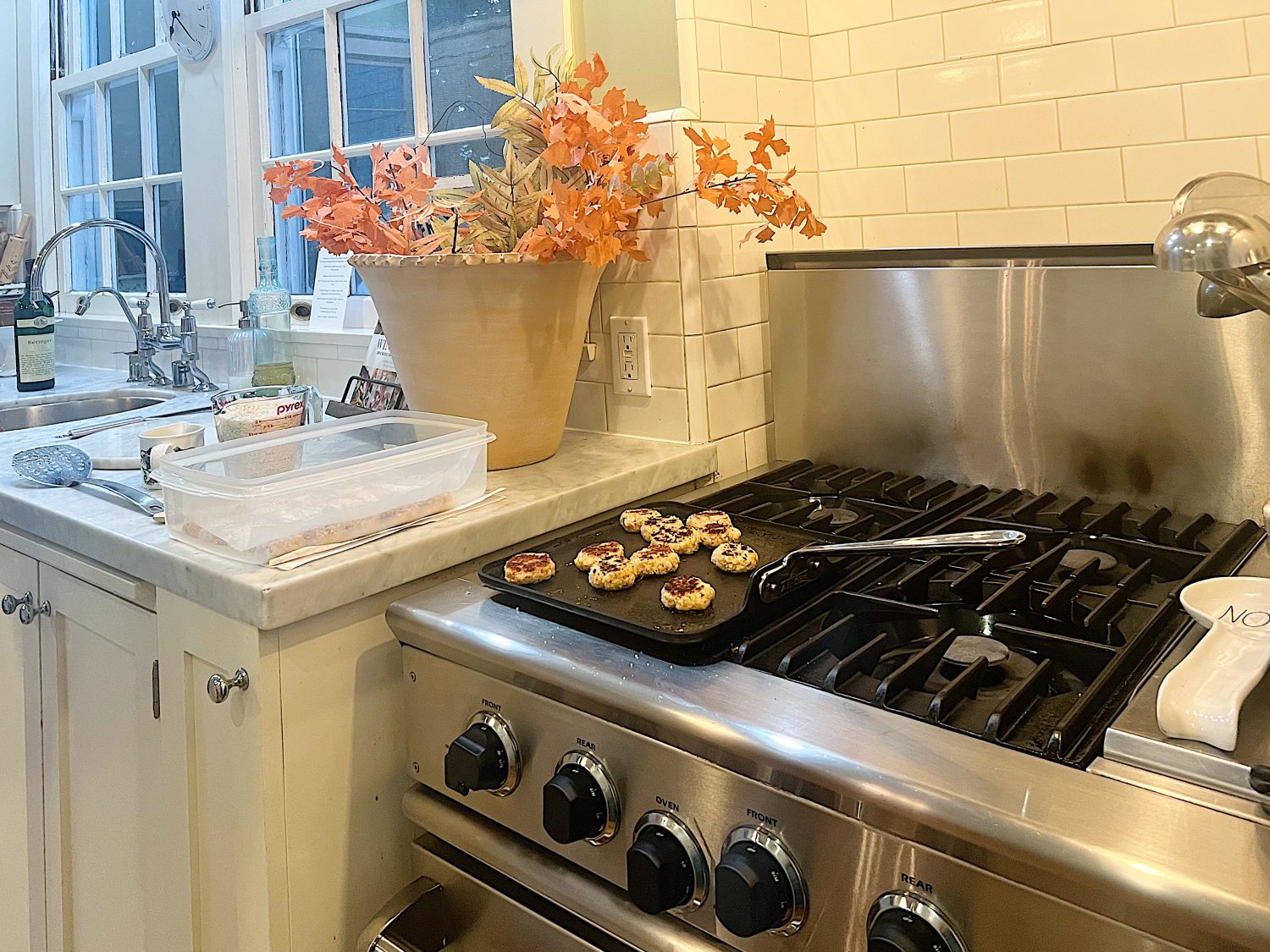 Cooking the crab cakes for a dinner for eight which was planned and hosted by us to benefit charity.