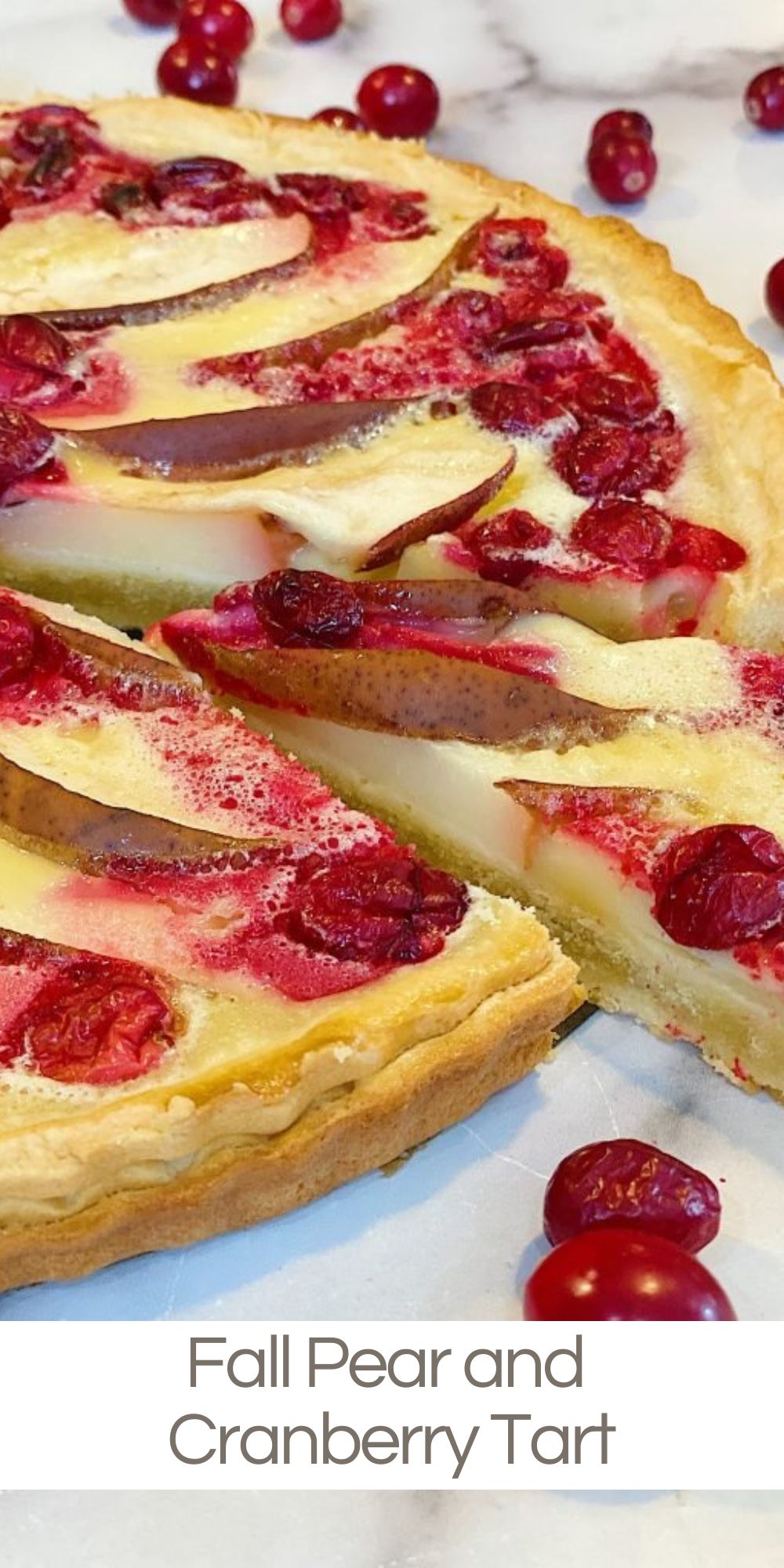 This fall pear and cranberry tart is amazing. It is a perfect combination of sweet and tart and this is a must recipe for fall baking.