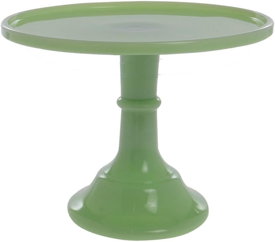 A green pedestal cake stand with a round flat top and a wide, sturdy base—perfect for showcasing your favorite desserts or a festive Pumpkin Trifle Recipe.