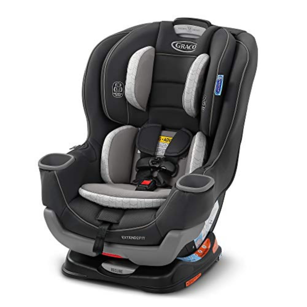 A black and gray Graco Extend2Fit convertible car seat, perfect for Halloween outings, featuring a safety harness and cup holders ideal for holding treats like sugar cookies.