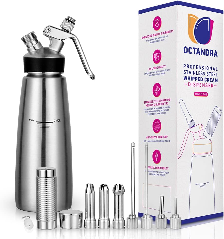 A stainless steel whipped cream dispenser with several nozzle attachments and a box labeled "Octandra Professional Stainless Steel Whipped Cream Dispenser," perfect for topping your favorite Pumpkin Trifle Recipe.