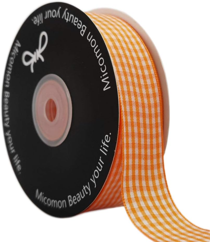 A spool of orange and white gingham ribbon with black circular ends, perfect for crafting a charming Thanksgiving wreath, labeled "Micomon Beauty your life.