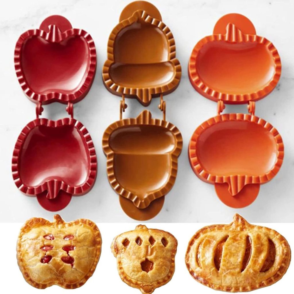 Three pie molds in apple, acorn, and pumpkin shapes are shown above matching baked pies, each with decorative cut-outs, arranged on a white surface—perfect for pairing with your favorite Pumpkin Trifle Recipe.