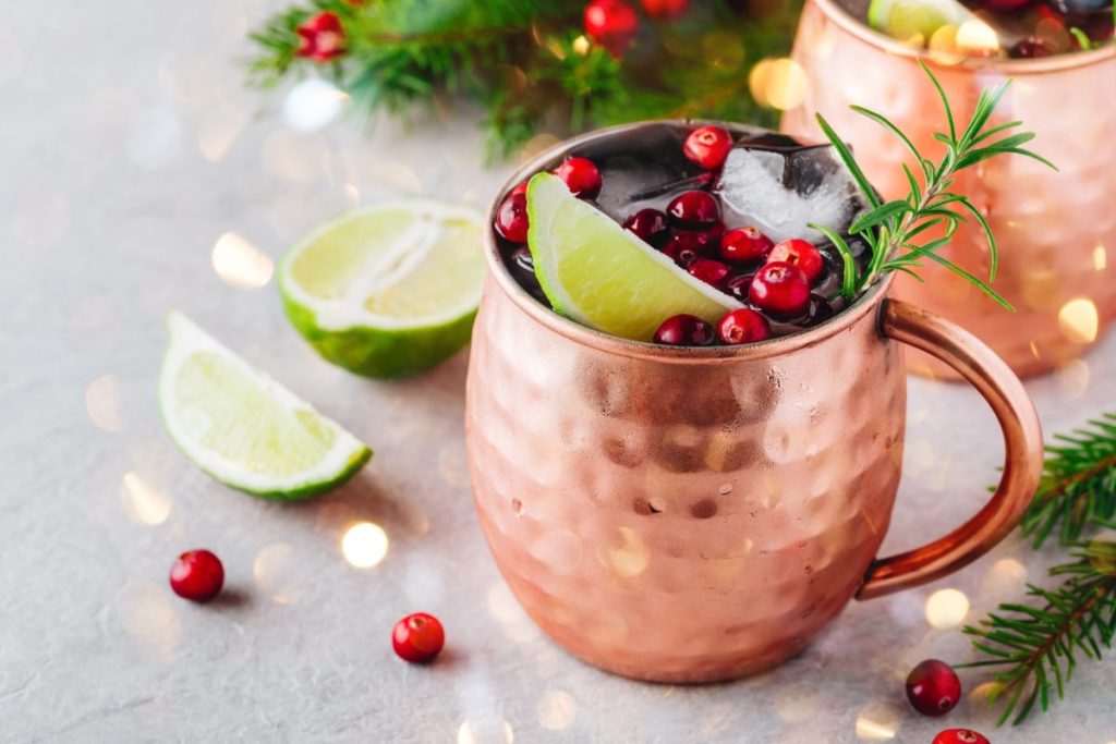 A Cranberry Mule drink in a copper mug