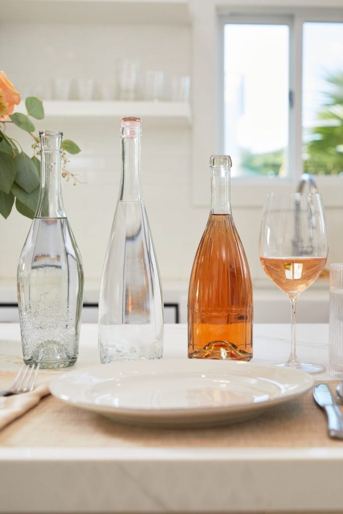 How to recycle wine bottles as elegant glass water bottles.