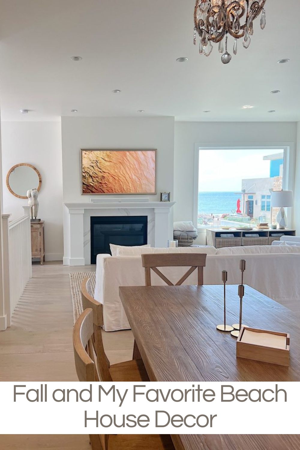 Our beach house decorated in light wood and white with orange accents.