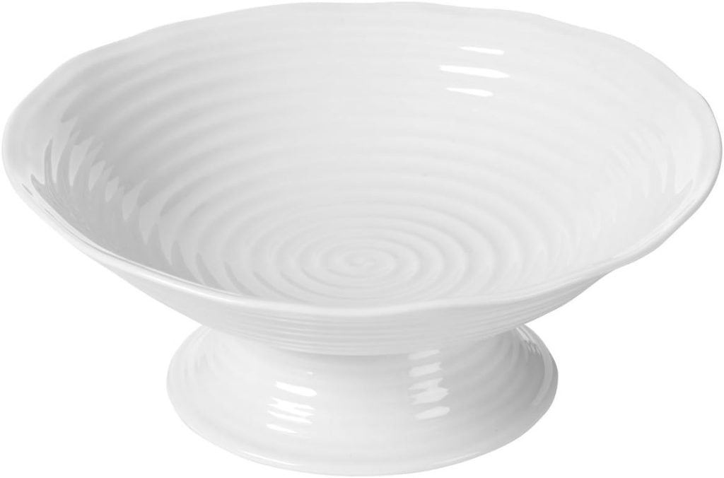 Set a Christmas table with elegance using this white ceramic pedestal bowl, featuring a charming rippled texture.