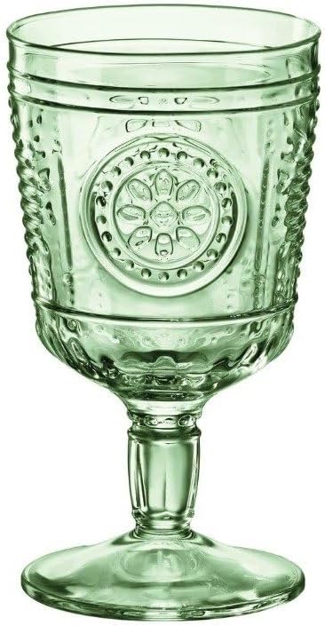 A green, ornate glass goblet with embossed patterns and a circular design on the bowl evokes cherished family traditions.