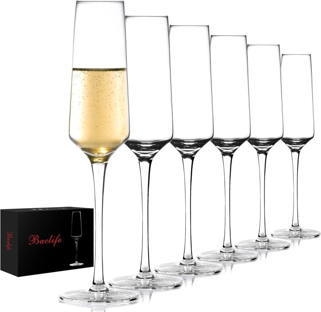 Six empty champagne flutes and one filled with bubbly, celebrating family traditions, next to a sleek black Baolife box.