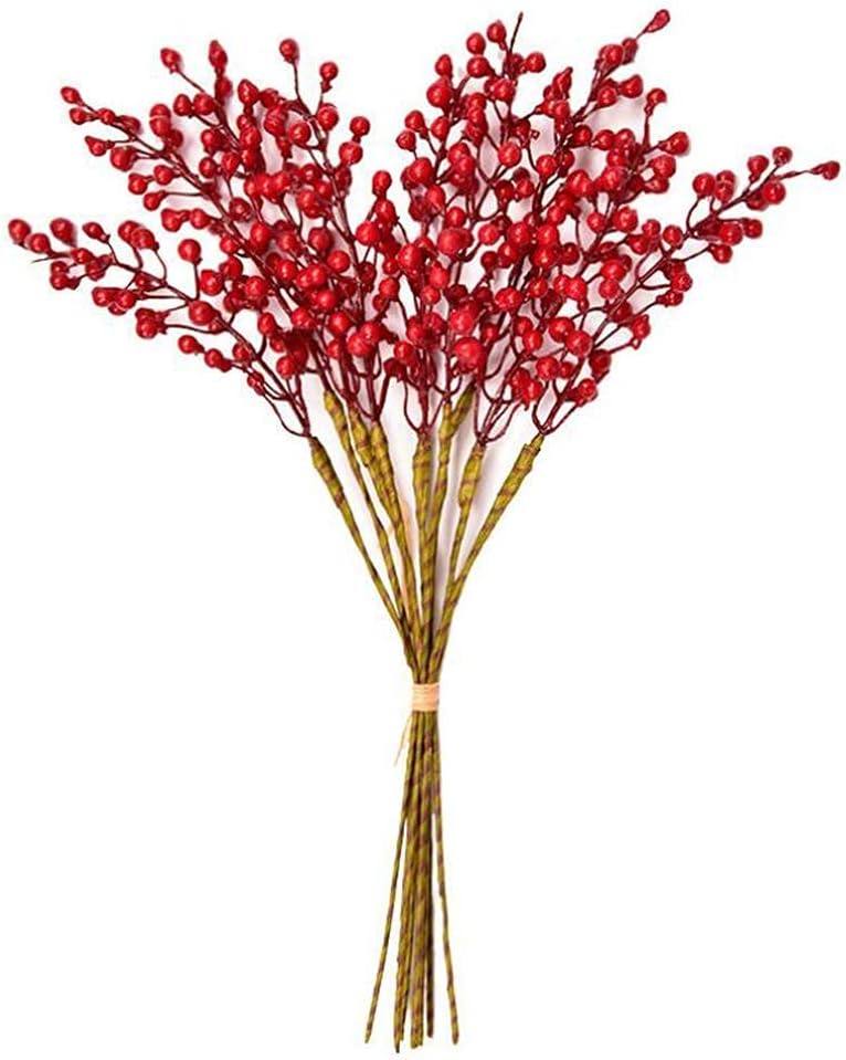 A bundle of artificial red berry stems, reminiscent of a vibrant vodka cranberry cocktail, tied together with a light-colored band.