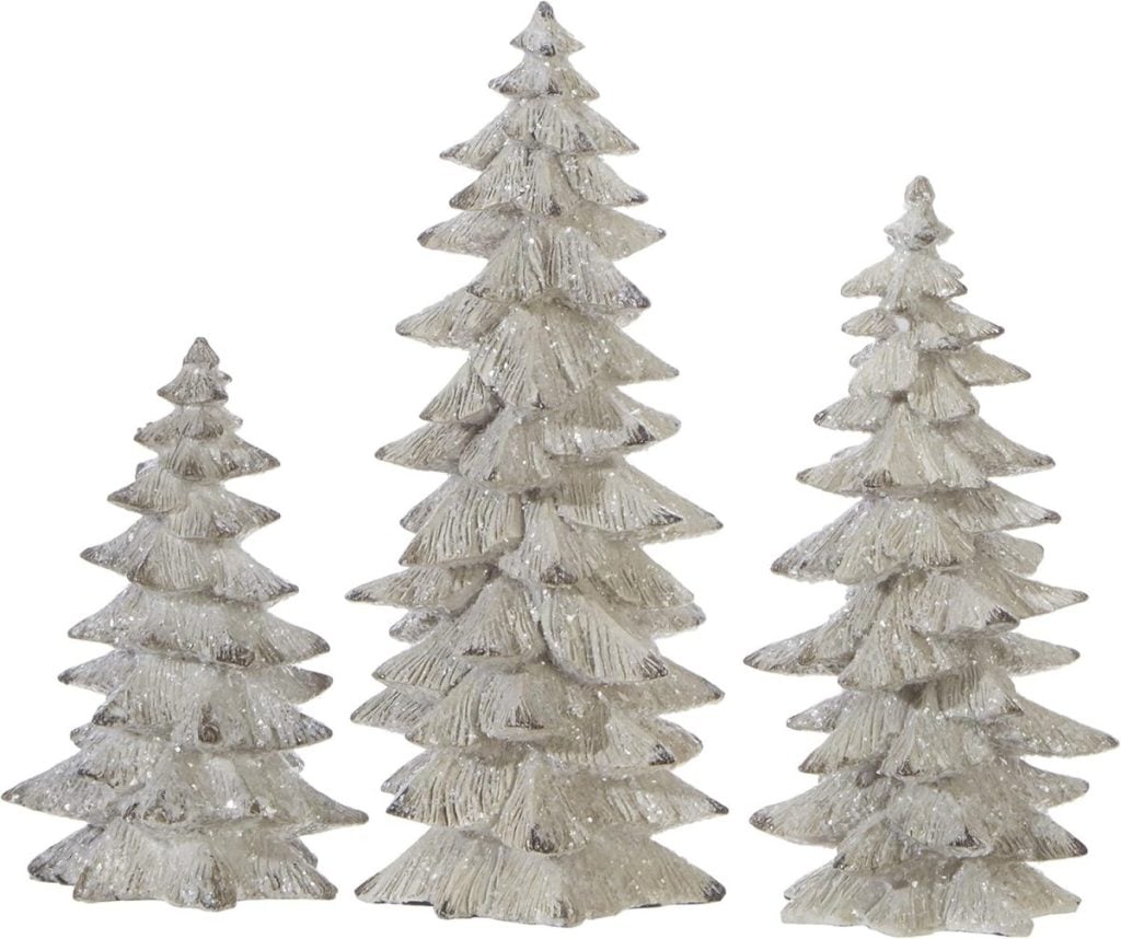 Three silver decorative pine trees of varying heights are displayed against a white background, perfect for setting a festive Christmas table.