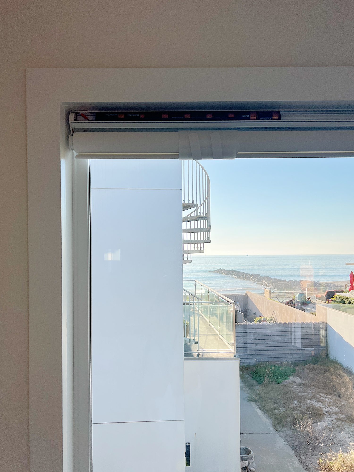 The large picture window at our beach house with an amazing view of the ocean.