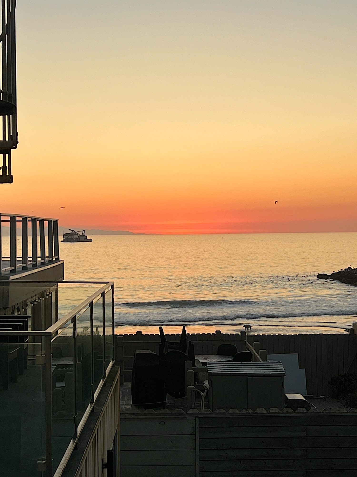 The large picture window at our beach house with an amazing view of the ocean.