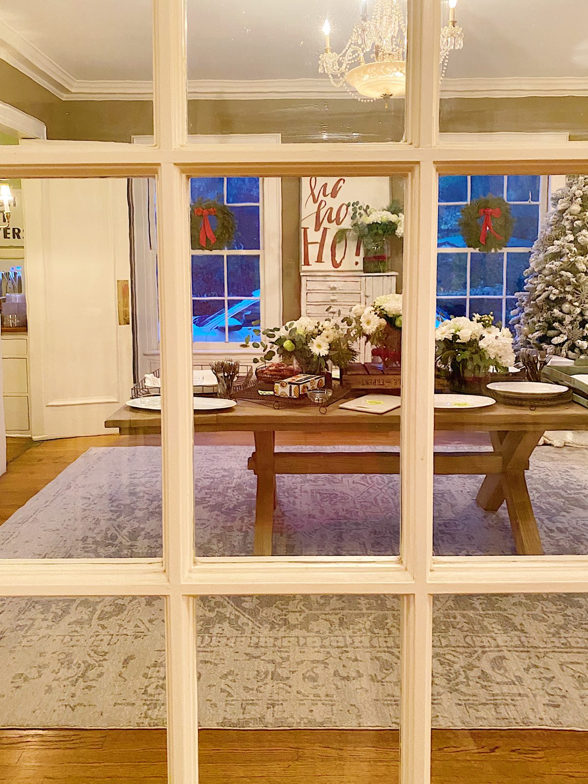 Peeking trhough the french doors in our dining room at the buffet table at our Christmas party.
