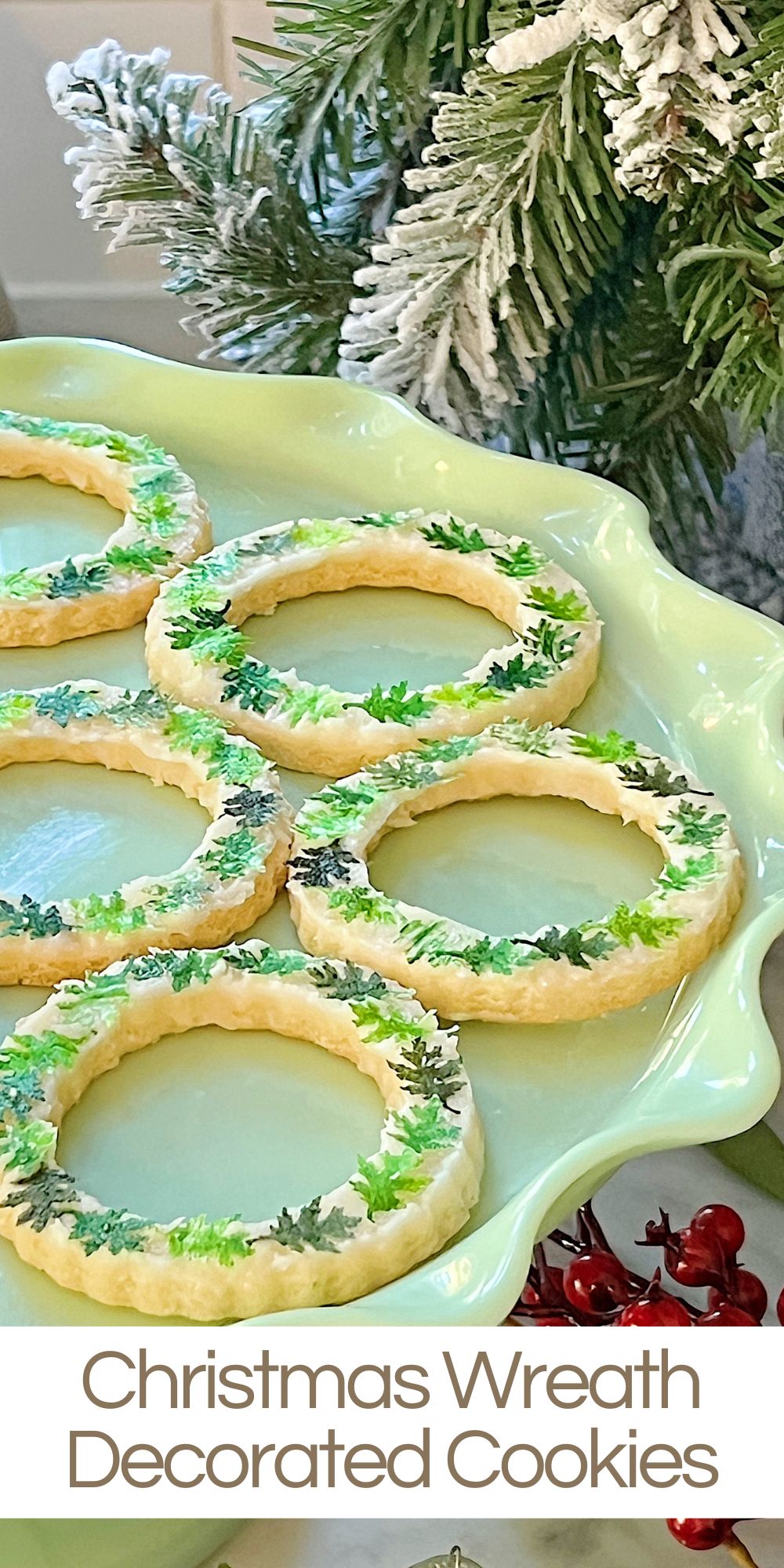 I made these Christmas wreath decorated cookies with frosting and wreaths made from edible wafer paper cut with a hole-punch.