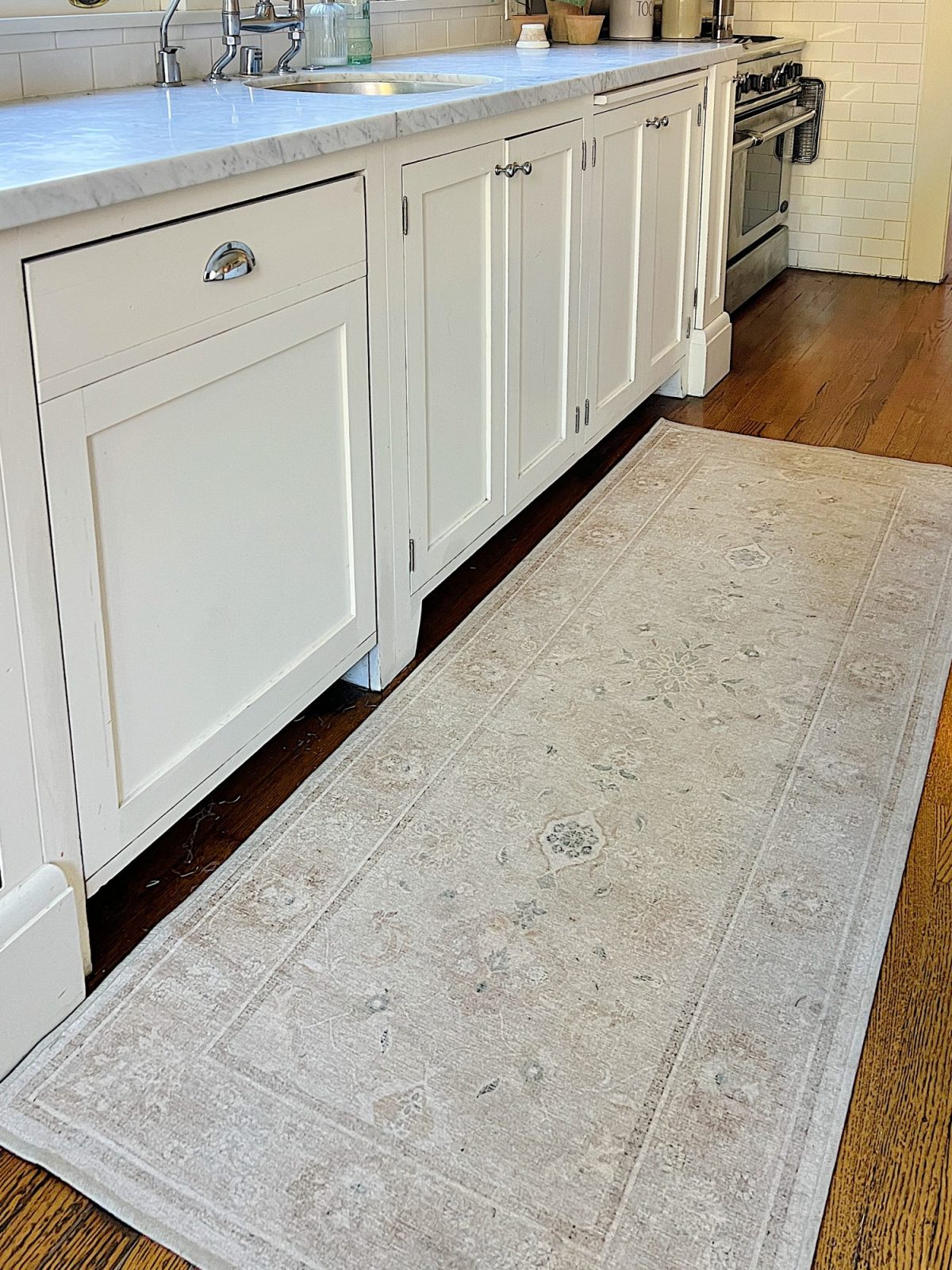 The new neutral colored washable rug in our kitchen.