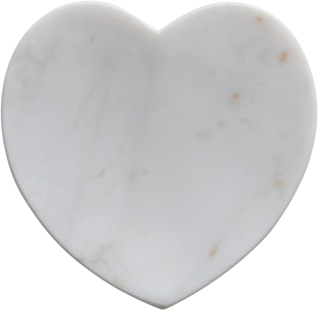 A marble heart-shaped coaster with subtle veining, perfect for showcasing cookie sticks, set against a white background.