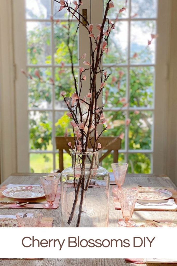 Handmade cherry blossoms made with tissue paper on our dining room table.