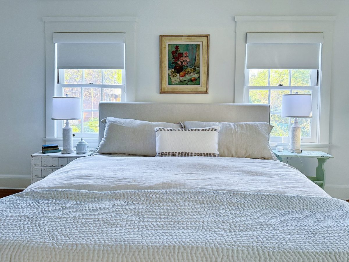 A bedroom makeover from two queens to a king and how to make the room well suited for guests.