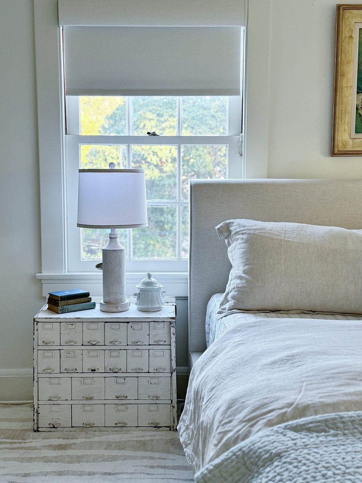 A bedroom makeover from two queens to a king and how to make the room well suited for guests.