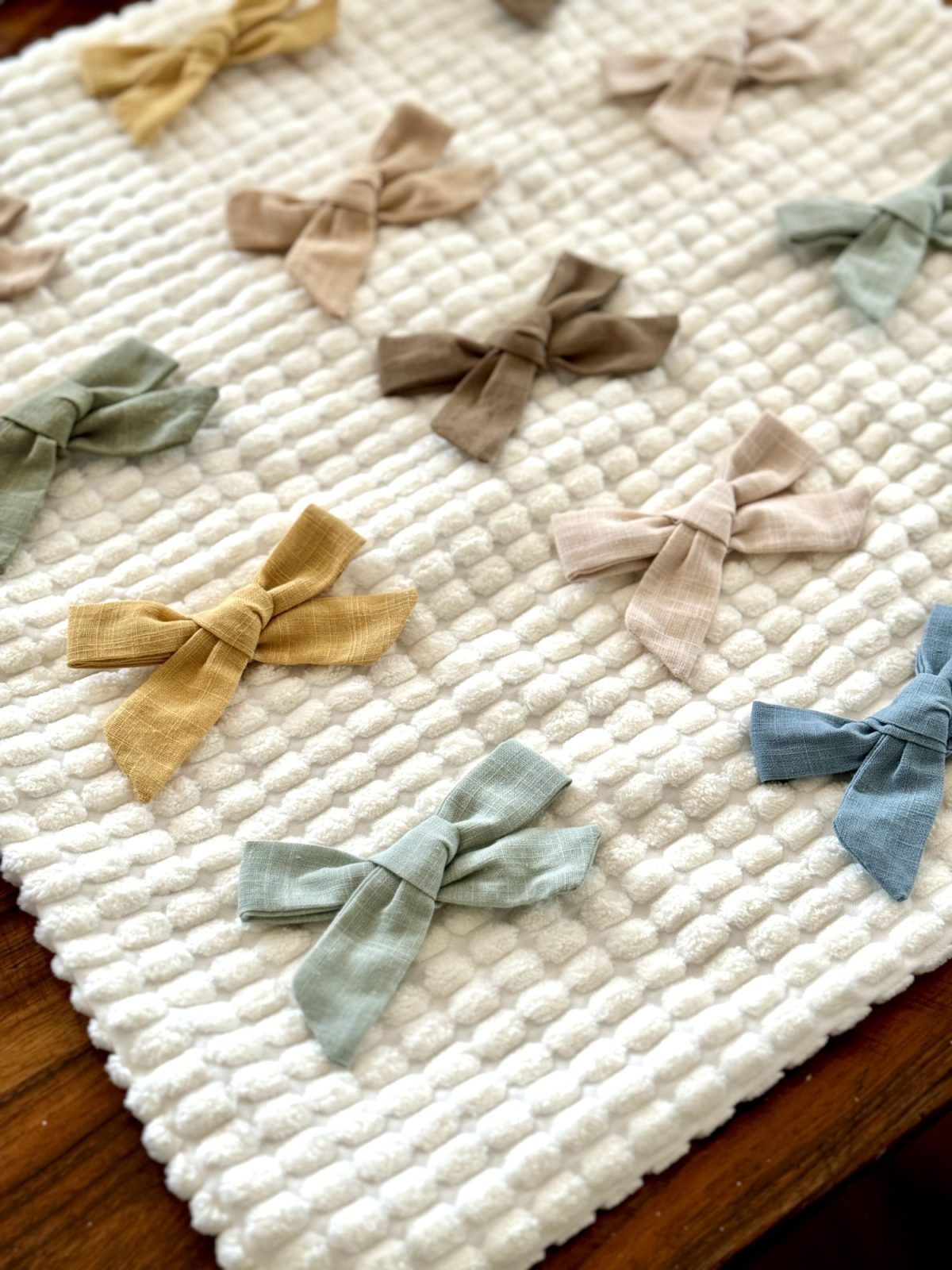 Ways to add bows to your home decor with pillows, art, and more.