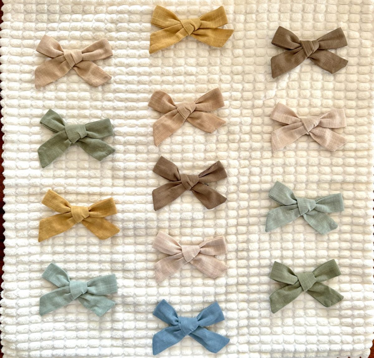 Ways to add bows to your home decor with pillows, art, and more.