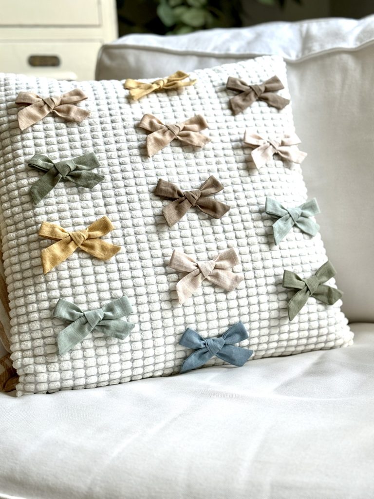 Ways to add bows to your home decor with pillows, art, and more.