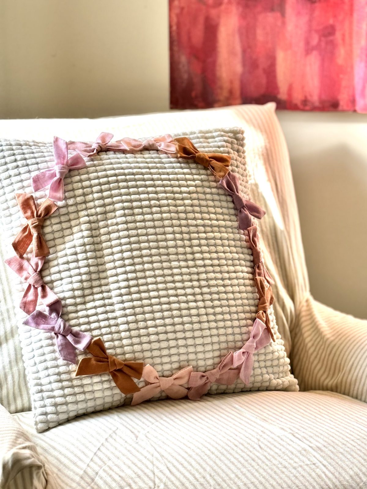 Ways to add bows to your home decor with pillows, art, and more.