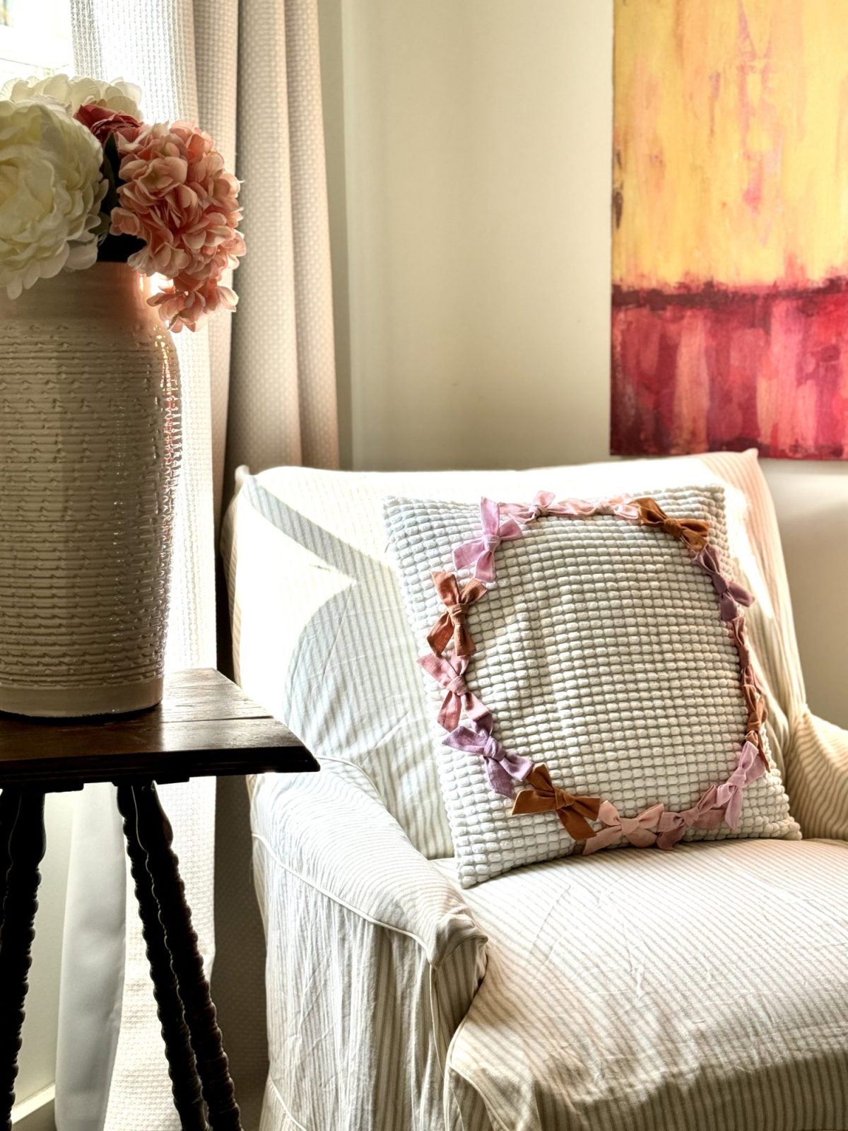 Ways to add bows to your home decor with pillows, art, and more.