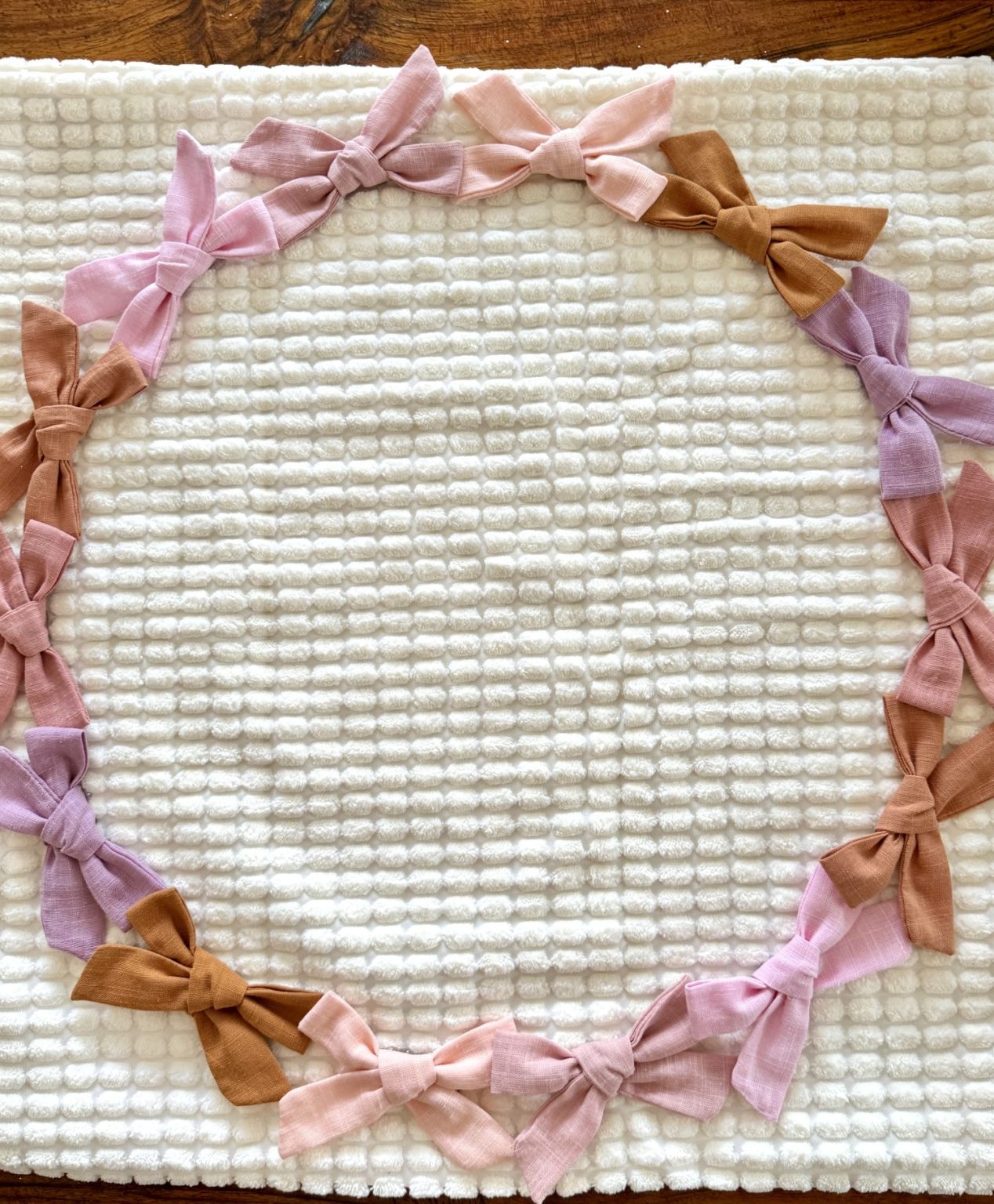 Ways to add bows to your home decor with pillows, art, and more.